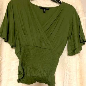 crossed ribbed green shirt